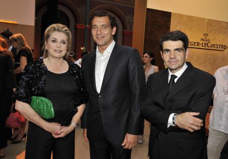 Catherine Deneuve, Clive Owen andJérôme Lambert during the party under the theme Capturing your magic moment.