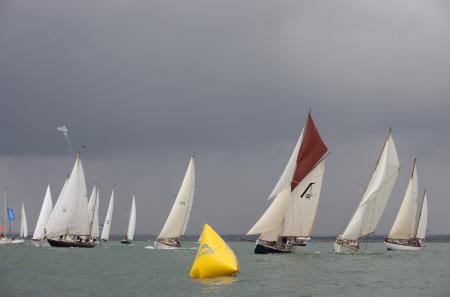 Competitors faced challenging 20 knot plus breezes as well as contrastingly light and capricious winds.