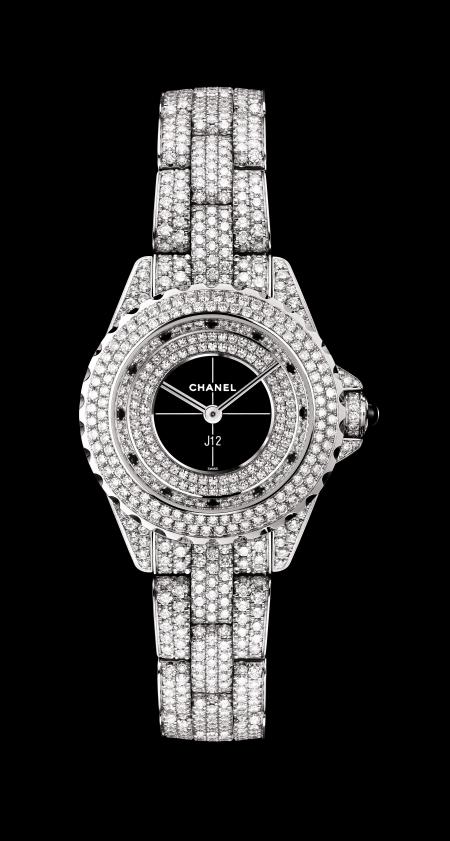 Chanel - J12 29mm watch in white gold set with diamonds. 