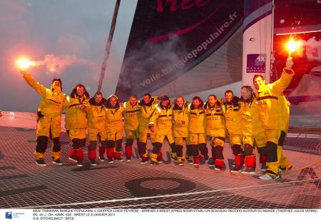 The team of Maxi Banque Populaire V on arrival at Brest. Proud to have established a new round the world record (Trophée Jules Verne).