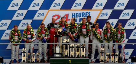 The Audi Sport Team on the highest steps of the Le Mans podium.