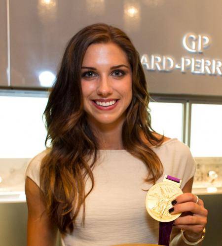 The US Soccer star Alex Morgan with her gold medal won at the London Olympic Games.
