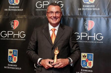 Jean-Christophe Babin, TAG Heuer President and CEO, with the trophy of the Geneva Watchmaking Grand Prix.