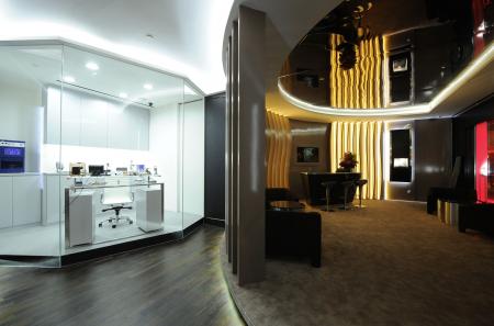 The watchmakers’ workshop and the lounge bar of the Richard Mille boutique at the Grand Hyatt Singapore.