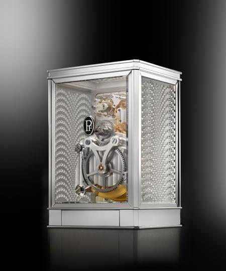 The clock 15 days Lalique - Parmigiani Fleurier, in white. Backside view.