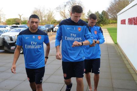 Arsenal football players Alex Oxlade-Chamberlain, Wojciech Szczesny and Kieran Gibbs