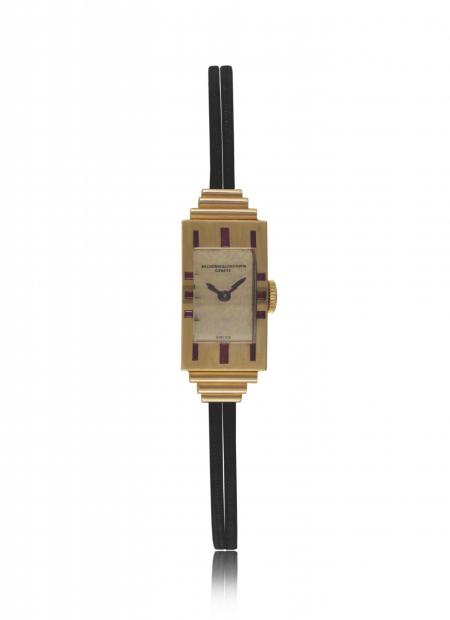 Art Déco 1939 - Lady's wristwatch, 18K pink gold, baguette?cut and square?shaped rubies. Gilt polished dial, double cord strap. N° 11087 