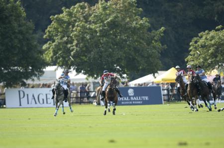 Facundo Pieres of Argentina battles for the ball against Luke Tomlinson of England - ©Nick Harvey