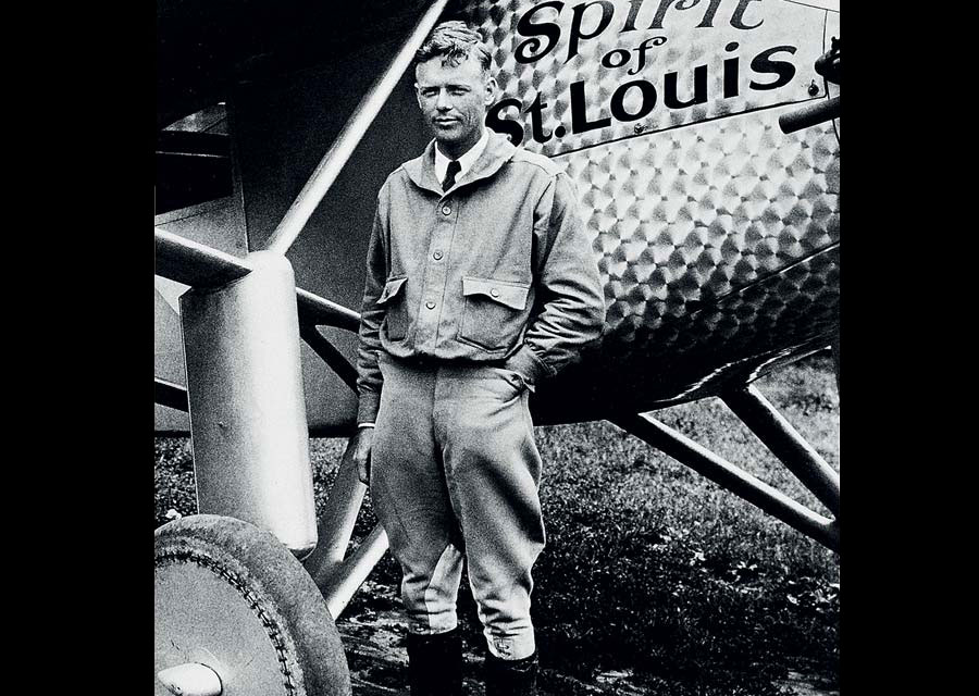 Charles Lindbergh in front of The Spirit of St. Louis