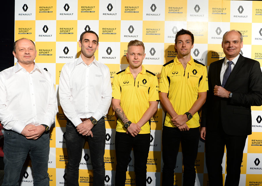 Carlos Rosillo with drivers Jolyon Palmer and Kevin Magnussen